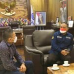 Kepala BP2MI, Benny Ramdhani (Pakai Masker Merah Putih) bersama Heintje Mandagie (Pakai Masker Putih) Ketua SPRI.