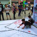 Aksi Bela Palestina di Car Free Day Makassar, (30/6/2024).