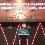 Camat Wajo, Drs. Nimrod Sembe, S.Sos., M.M., yang memberikan sambutan mewakili Pemerintah Kota Makassar.