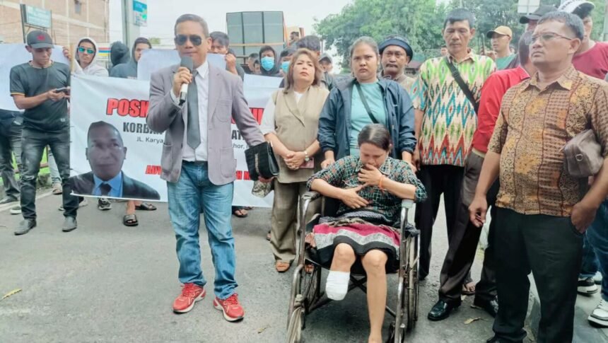 Korban malapraktik dan JPMD gelar aksi di Polda Sumut, (24/3/2025).