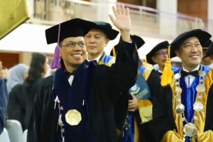 Sidang Senat Terbuka dalam rangka pengukuhan Prof. Ilham Junaid, S.Pd., M.Hum., Ph.D sebagai Guru Besar dalam Bidang Pengelolaan Operasional Perjalanan Wisata.