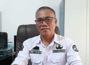 Kepala Sekolah SMKN 5 Makassar, H. Amar Bachti, S.Pd., M.M.