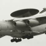 Prototipe AWACS KJ-2000, pesawat peringatan dini adalah sebuah sistem radar yang dibawa oleh sebuah pesawat terbang yang dirancang untuk mendeteksi pesawat terbang lain. Radar ini dapat membedakan antara pesawat terbang kawan dan pesawat terbang musuh dari jarak jauh. (The GIMP/HO/MP)