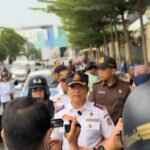 Irwan, SE., MM., Kepala Bidang Terminal dan Perparkiran Dishub Kota Makassar saat memberikan keterangan kepada media terkait penertiban parkir liar dan terjadinya kemacetan di kawasan komersial tersibuk kota, Juli 2025.