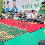 Para tokoh dan jamaah Al-Washliyah Sumut khusyuk berdoa bersama dalam kegiatan “Al-Washliyah Bermunajat: Untuk Sumatera Utara yang Aman dan Damai” di Medan, Sabtu (6/9/2025) malam.