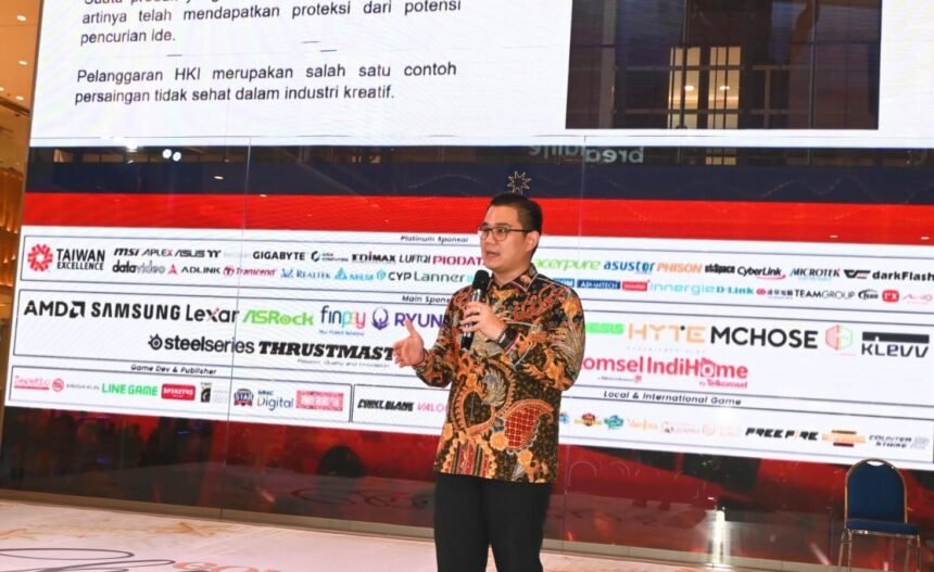 Pembicara Vincent Suriadinata, SH., MH., Managing Partner Mustika Raja Law Office menyampaikan materi terkait perlindungan hukum dan HKI di industri game dalam forum diskusi IGX 2025.
