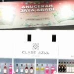 Toko Anugerah Jaya Abadi yang berlokasi di kawasan elite Jalan Metro Tanjung, Kecamatan Tamalate, memajang dan menjual berbagai jenis minuman beralkohol golongan A, (20/11/2025). (Kolase: R3/HO)