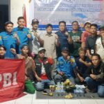 Para buruh pelabuhan Makassar bersama KPBI berkumpul dalam Konferensi I PUK untuk memperkuat solidaritas dan memperjuangkan hak-hak pekerja.