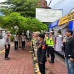 Apel kesiapan personel gabungan di Pos Terpadu Batas Kota Gowa–Makassar jelang pengamanan Natal 2025 dan Tahun Baru 2026.