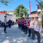 Personel Polresta Gowa mengikuti apel pengecekan kesiapan pengamanan kegiatan baksos dan doa bersama dalam rangka HUT ke-81 Kemerdekaan RI.